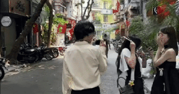 Thanh niên cầm máy ảnh dí sát mặt người đi đường gây tranh cãi: Nghệ thuật hay thô lỗ? Người trong cuộc nói gì?